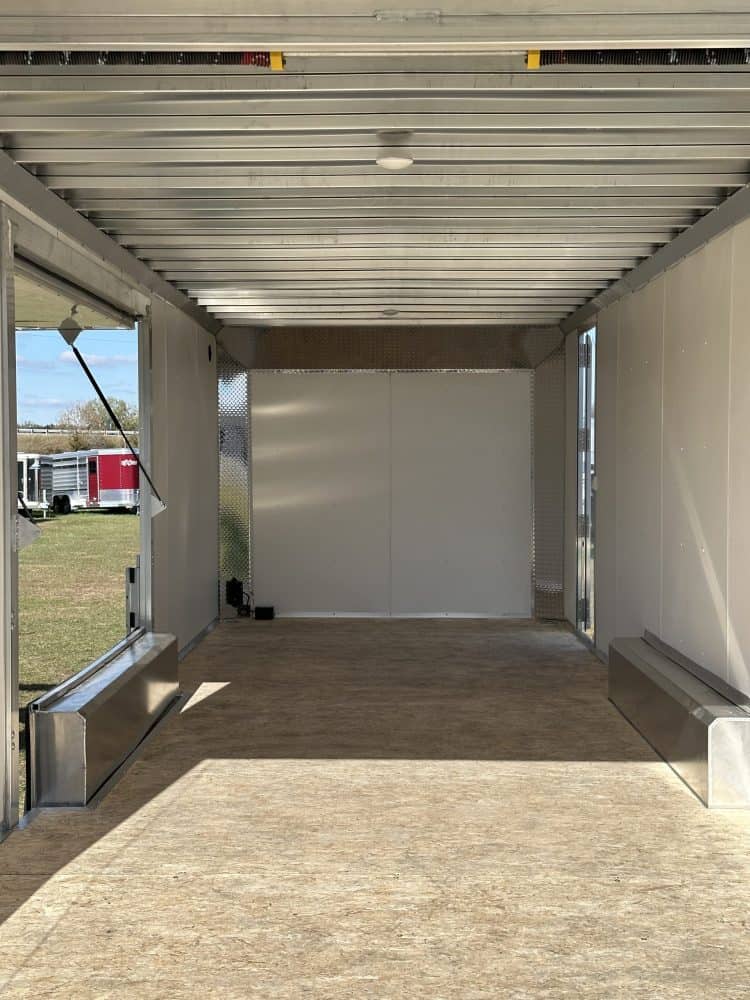 Enclosed car hauler trailer with 8.5'x24' dimensions, ideal for transporting vehicles securely. Features durable construction, spacious interior, and easy loading for automotive enthusiasts and profes.
