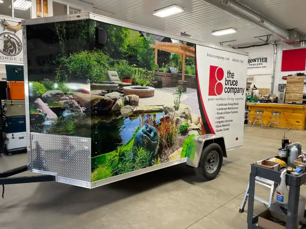 Mobile trailer display showcasing outdoor landscaping and water features at I39 Supply, a leading trailer dealership. Perfect for outdoor event marketing and promotional displays.