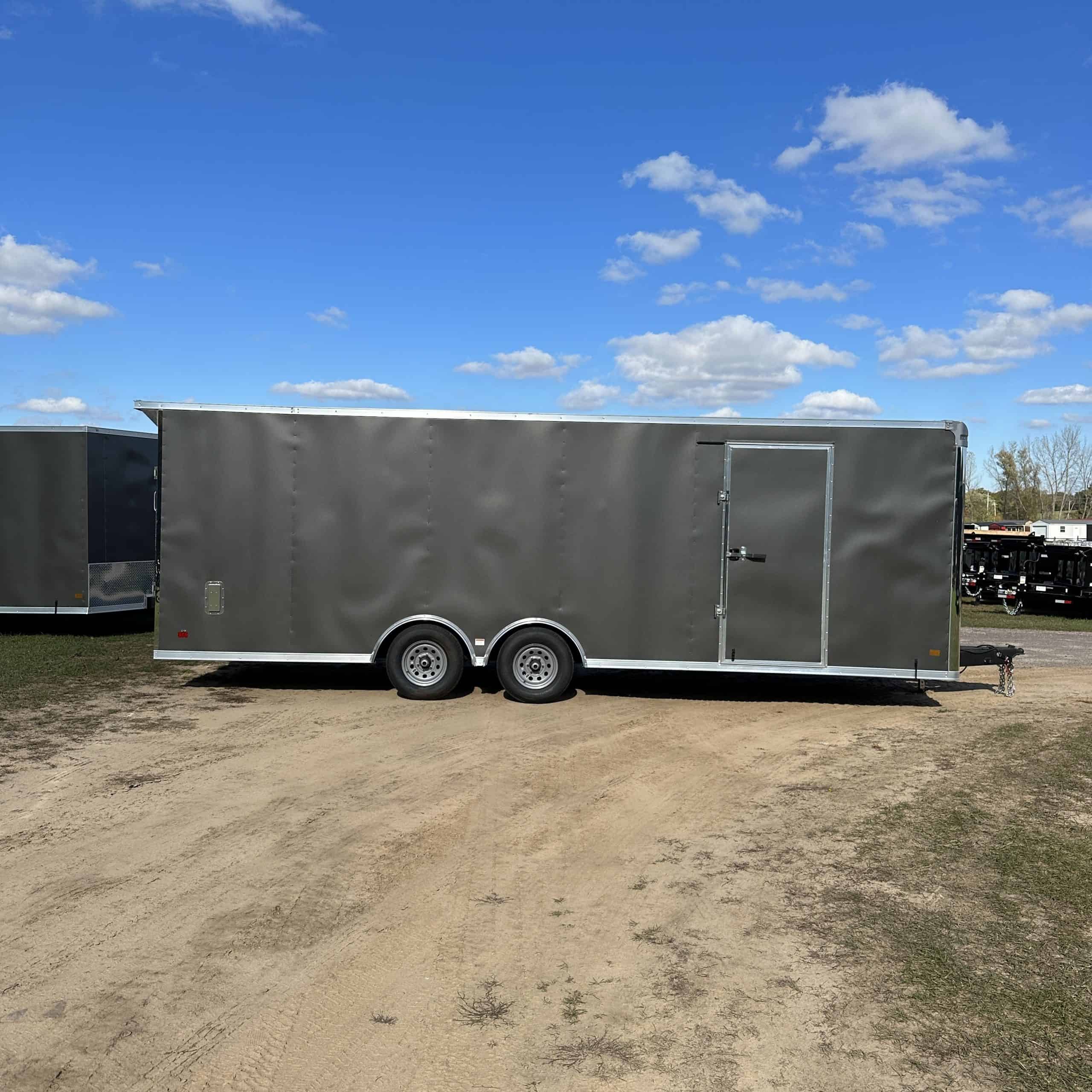 High-capacity 8.5' x 24' cargo trailer with tandem axles, ideal for heavy-duty hauling and storage needs.