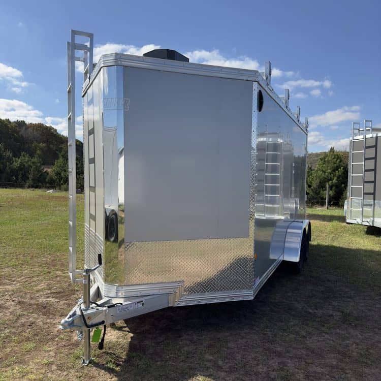 Durable aluminum cargo trailer showcased at I39 Supply dealership, ideal for commercial and personal use, featuring a sleek design and sturdy construction.