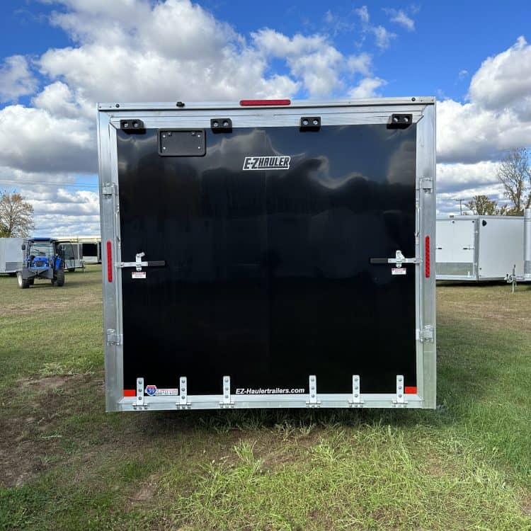 Black EZ Hauler XLT tandem axle trailer with 8.5' x 16' dimensions, ideal for hauling equipment and cargo, available at I39 Supply Trailer Dealership.
