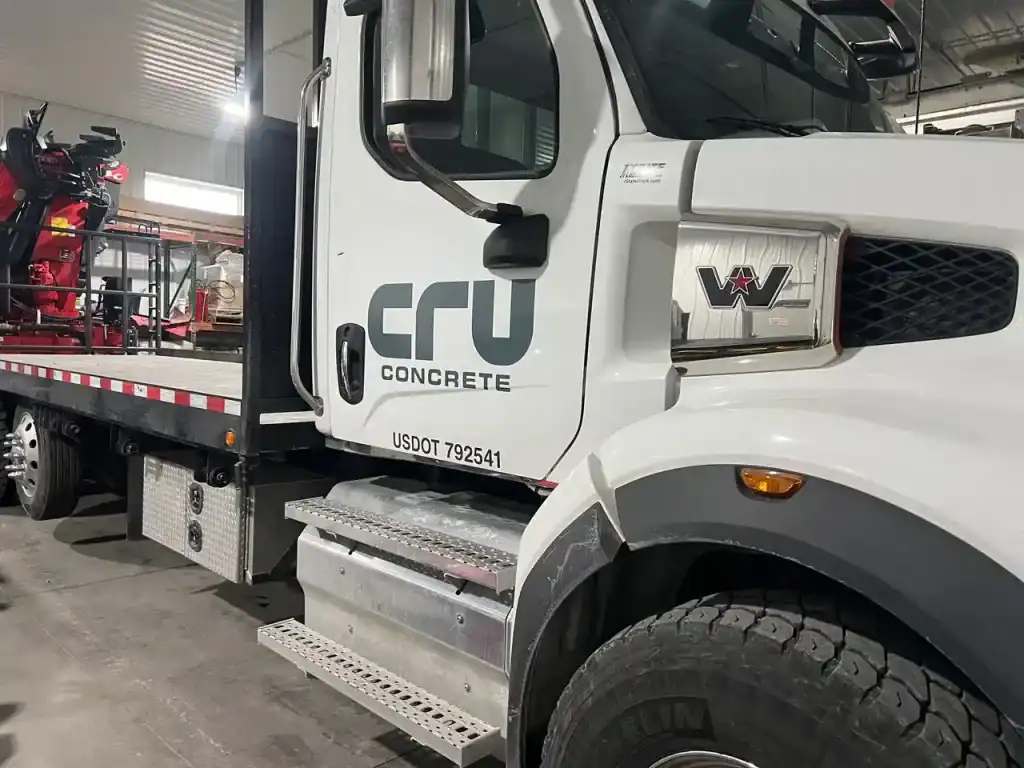 Heavy-duty concrete truck trailer with CRU Concrete branding, designed for construction and transportation of concrete. Ideal for commercial use and durable in tough job site conditions.