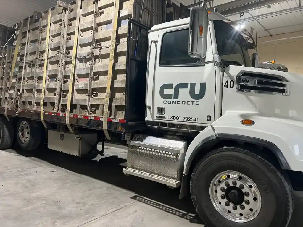 Heavy-duty concrete mixer truck available for purchase at I39 Supply Trailer Dealership, ideal for construction and concrete delivery projects.