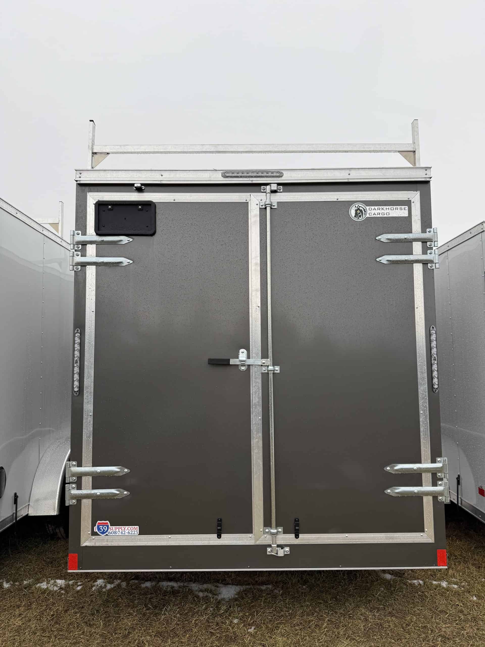 Heavy-duty enclosed trailer for commercial and handyman use at I39 Supply. Perfect for transporting tools, equipment, and supplies securely.