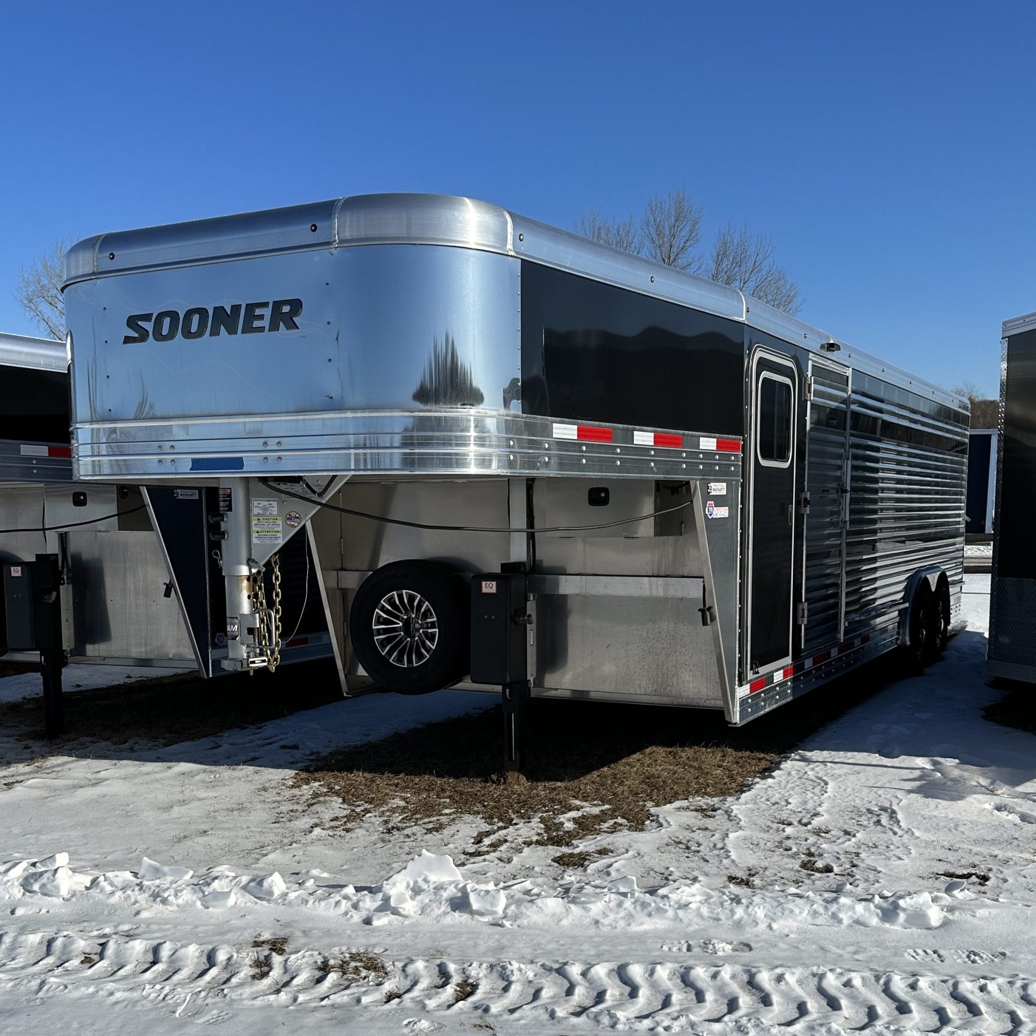 Modern SOONER SRD 8024 trailer displayed at I39 Supply trailer dealership, showcasing durable construction and spacious design for commercial and recreational use.
