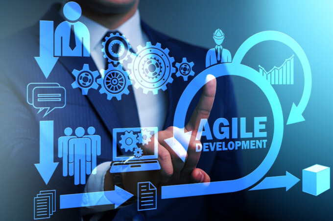 Agile development methodology with gears and charts for project management.