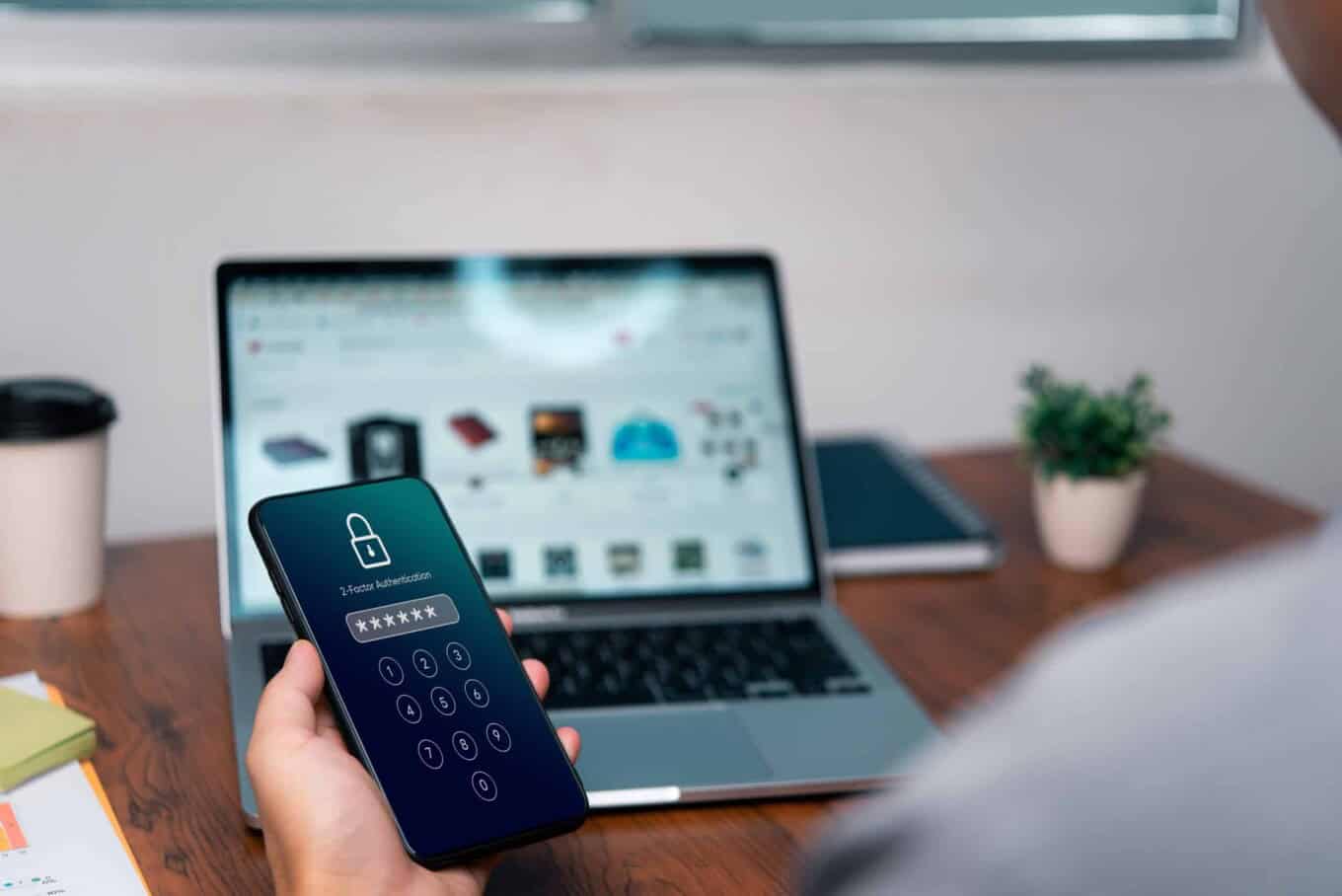 Person using smartphone with lock screen, emphasizing identity access management.