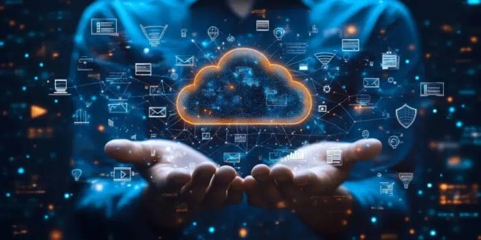 Cloud computing and data security concepts with hands holding digital cloud image.