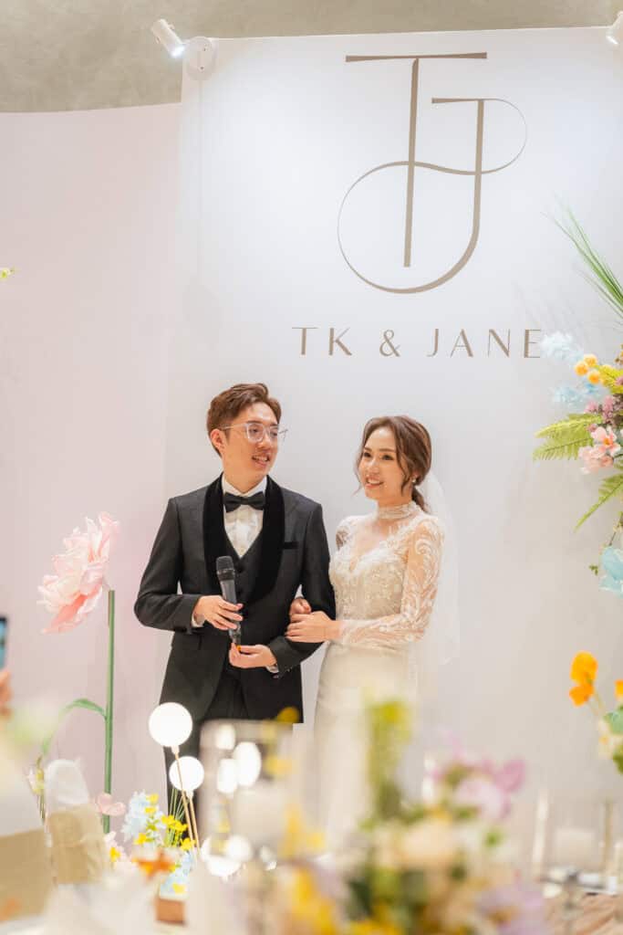 Bride and groom newlyweds giving speeches at wedding catering event by iDoCatering in Malaysia