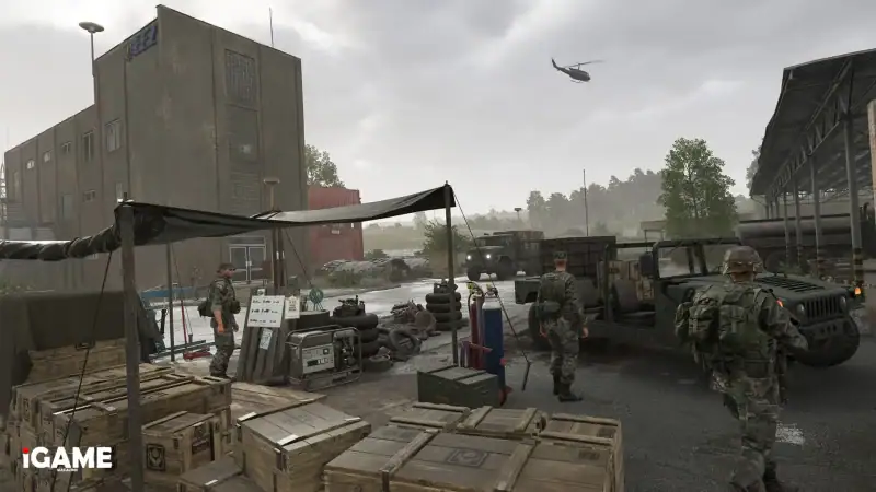 US soldiers and military vehicles at a supply base in the Arma Reforger 1.8 Update