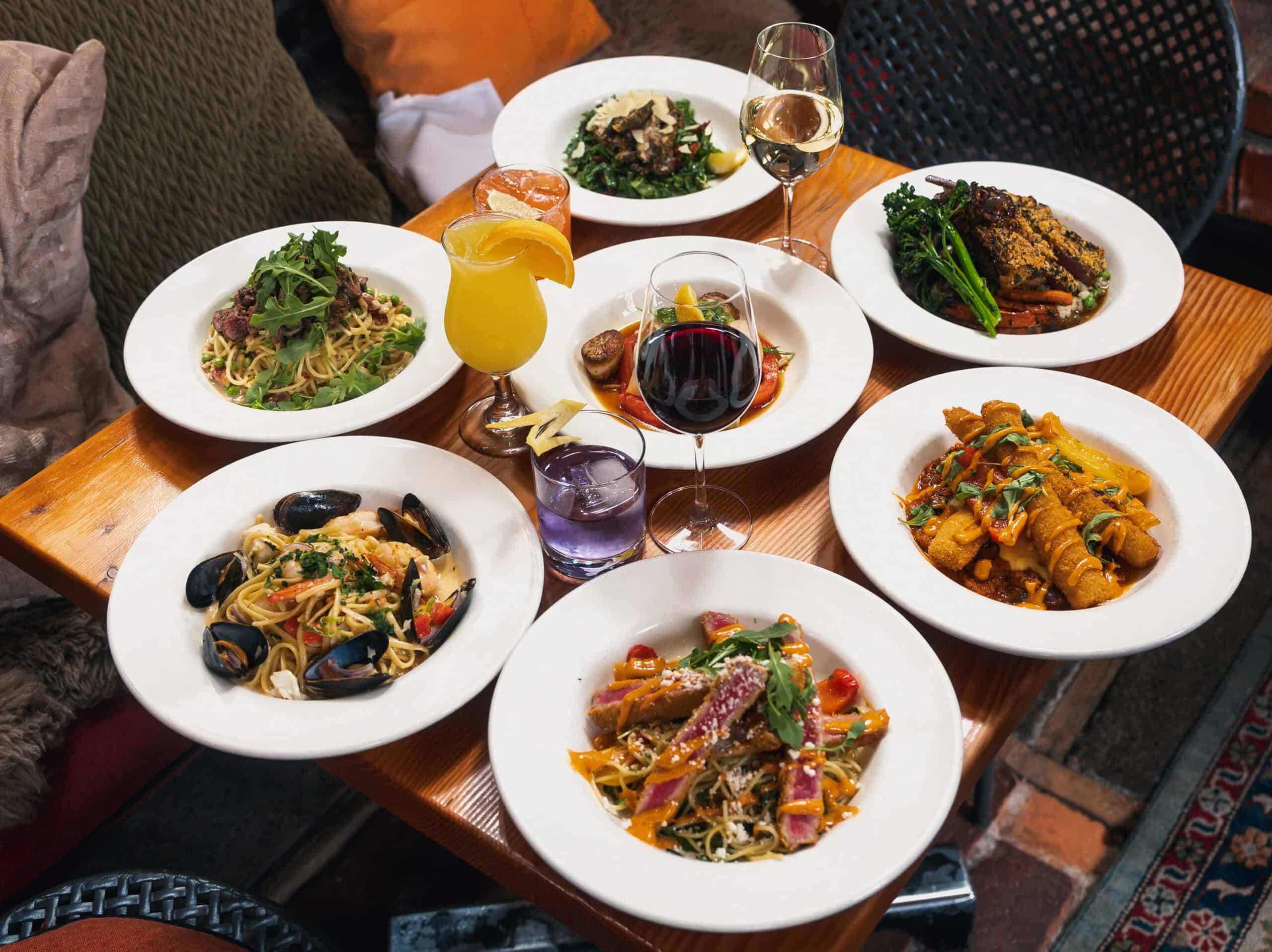 Assorted Italian pasta dishes with wine and cocktails at Il Terrazzo Italian Restaurant in Victoria