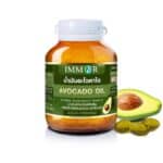 a bottle of avocado oil next to a half of avocado
