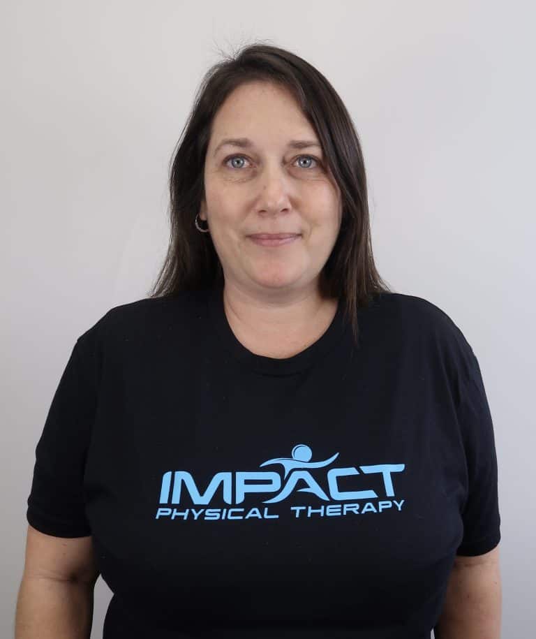 Lara Jones wearing Impact Physical Therapy shirt for rehabilitation.