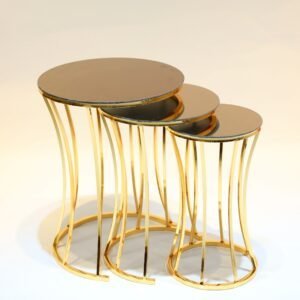 Nested round tables with mirrored tops, gold frames, cascading design, and curved legs.