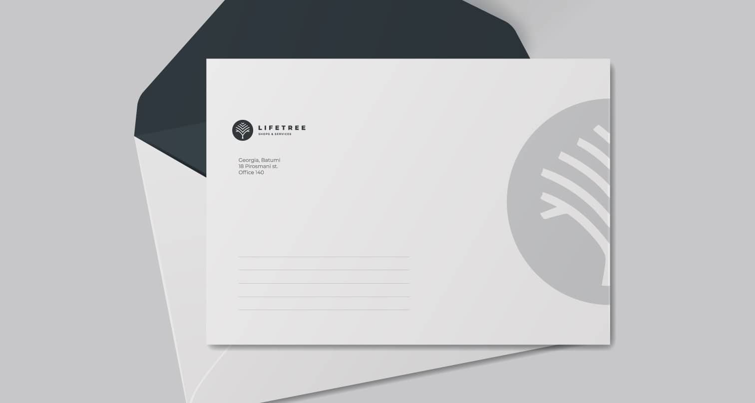 Envelope with "Independence We Trust" message on a gray background, emphasizing patriotism and freedom.