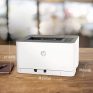 High-quality HP laser printer with compact design, measuring 38.2cm wide, 21.1cm high, and 39.6cm deep for efficient, affordable printing solutions.