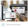 A4 colour printer printing detailed architectural plans in an office setting, showcasing efficient document printing technology.