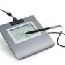 Digital signature pad with stylus and LCD screen, used for electronic signatures in business transactions and secure document signing.