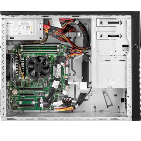 High-performance desktop computer interior showcasing a motherboard, CPU cooler, power supply, and various cables, emphasizing affordable innovation in technology solutions.