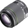 High-quality camera lens for professional photography, featuring zoom capabilities up to 200mm, perfect for capturing detailed images in various shooting scenarios.