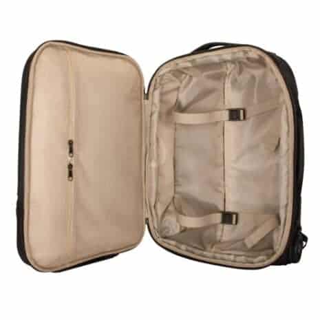 Light grey travel suitcase interior with straps and organizational compartments, ideal for business trips and personal travel needs. Durable and spacious design for safe luggage storage.