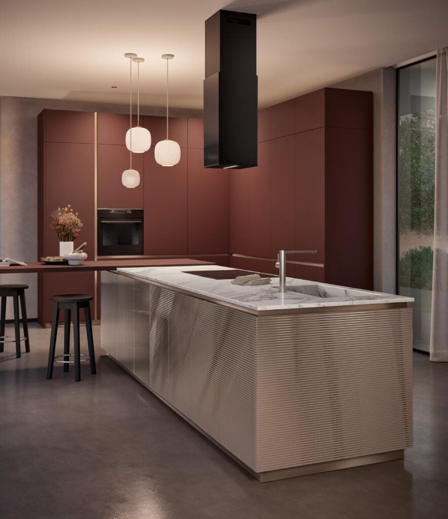 Modern kitchen with a central island featuring a marble countertop, textured cabinetry, pendant lights, and brown cabinets in the background.