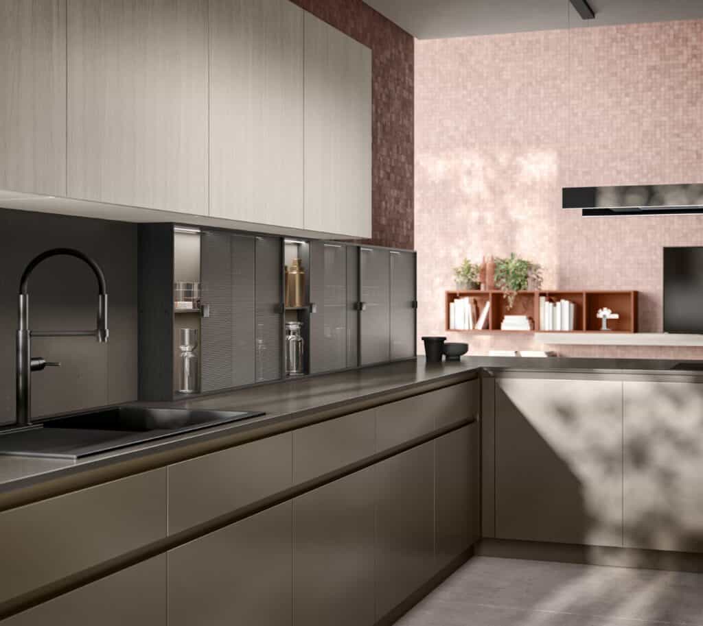 Modern kitchen with sleek cabinetry, dark countertop, integrated sink, and glass panel doors; light streaming through casting soft shadows.