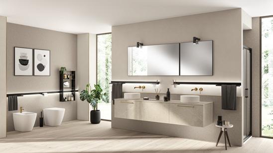 Aquo_213 - Inspo Living Spaces Modern bathroom with two sinks, large mirrors, a freestanding bathtub, and contemporary decor.