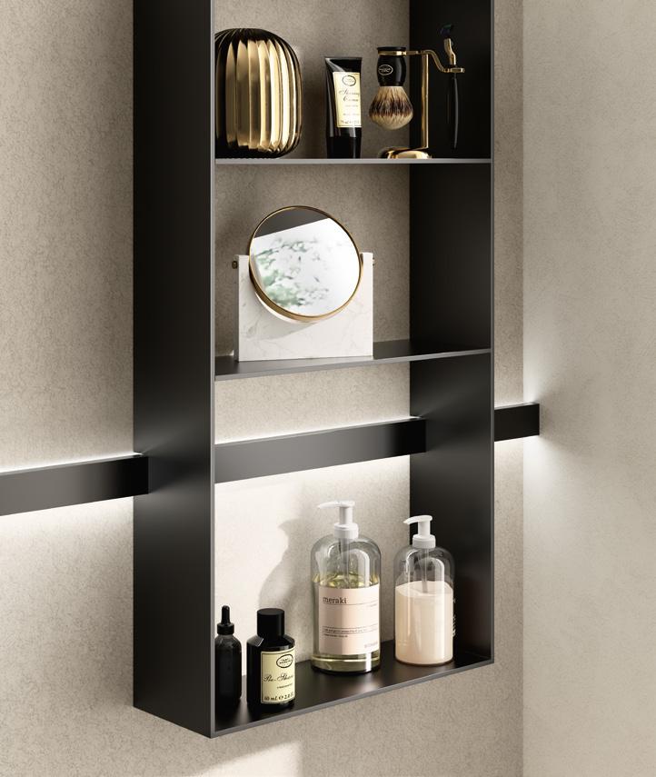Bathroom shelf with assorted grooming products and accessories, including dispensers, a mirror, and decorative items.