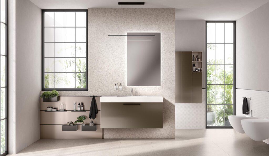 Modern bathroom with large windows, minimalist beige cabinets, and a wall-mounted sink.