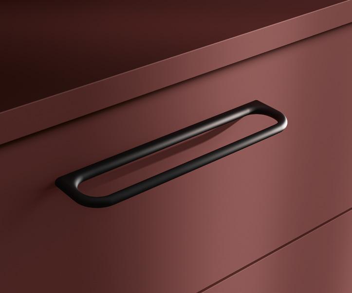 Brown cabinet drawer with a black handle.
