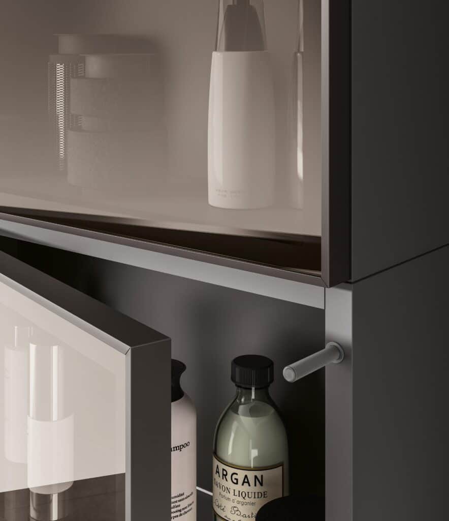 Bathroom cabinet with various toiletries, including bottles and jars, inside open and closed compartments.