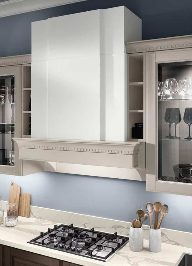 Modern kitchen with white cabinetry, glass display shelves, a marble countertop, and a built-in gas stove.