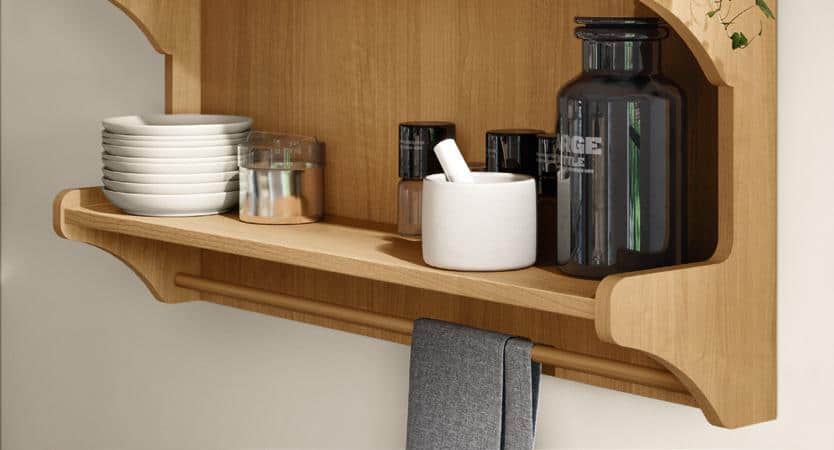Wooden wall shelf with plates, containers, a mortar and pestle, and a hanging towel.