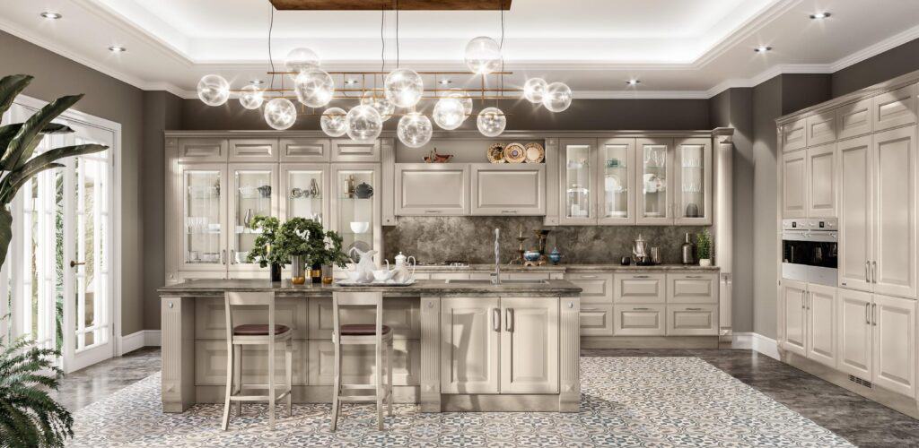 Spacious modern kitchen with beige cabinets, a marble countertop island, patterned floor tiles, and a large chandelier with globe lights.