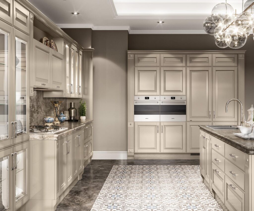 Elegant kitchen with beige cabinets, a patterned runner rug, stainless steel appliances, marble countertops, and a modern chandelier.