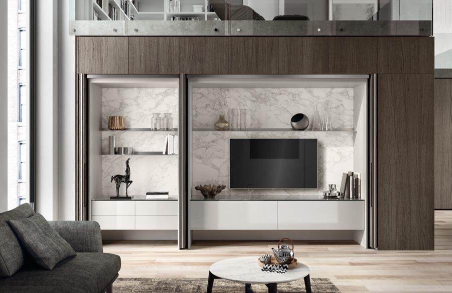 Modern living room with a loft, featuring a wooden and marble TV unit with shelves and decorative items.