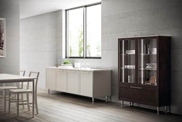 Modern dining room with a large window, white sideboard, dark wood cabinet with glass doors, and a white dining table with chairs.