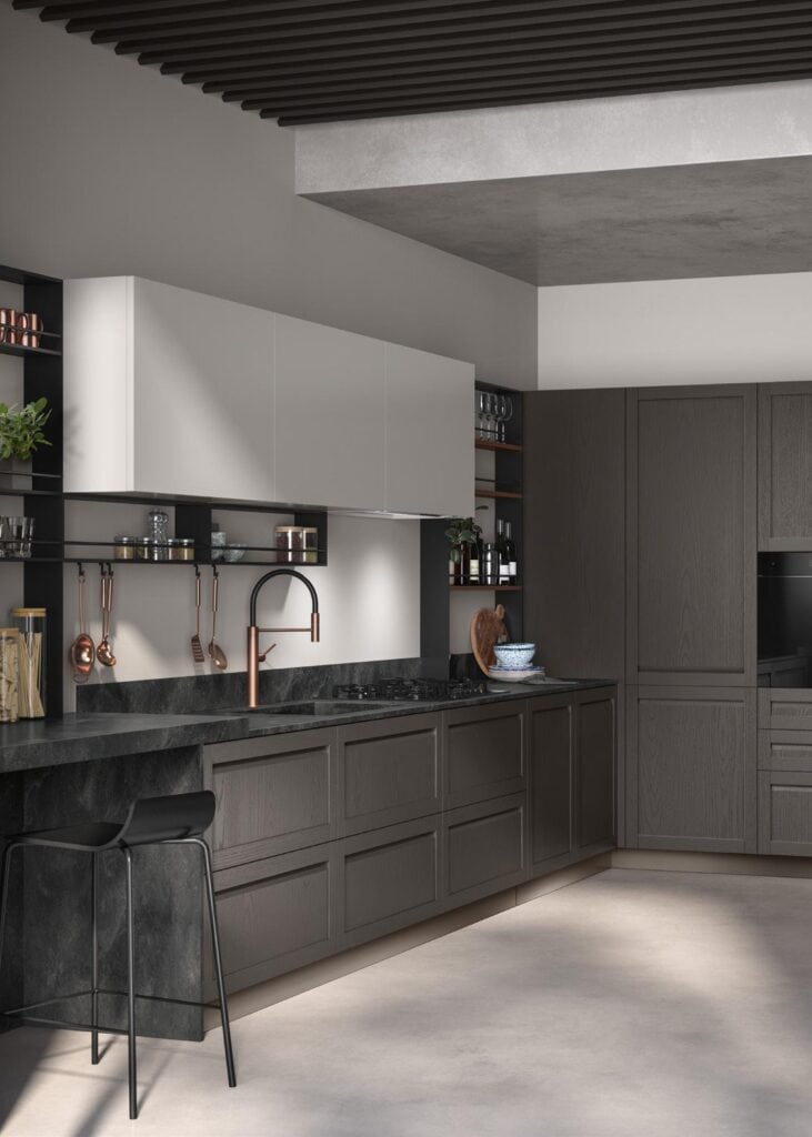 Modern kitchen with dark wood cabinets, marble countertops, a black bar stool, and copper faucets.