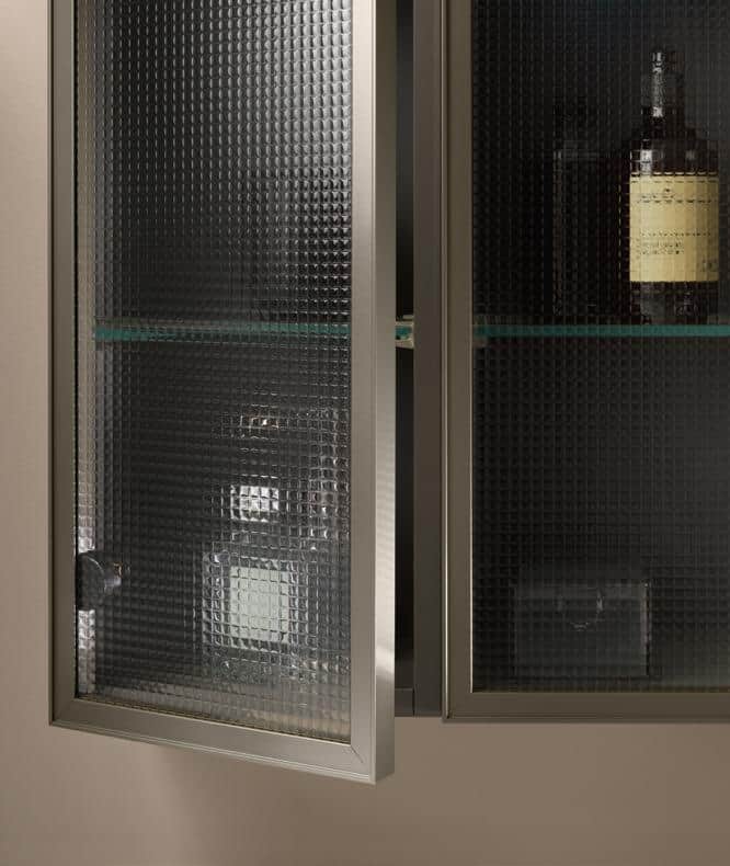 Textured glass cabinet with bottles inside.