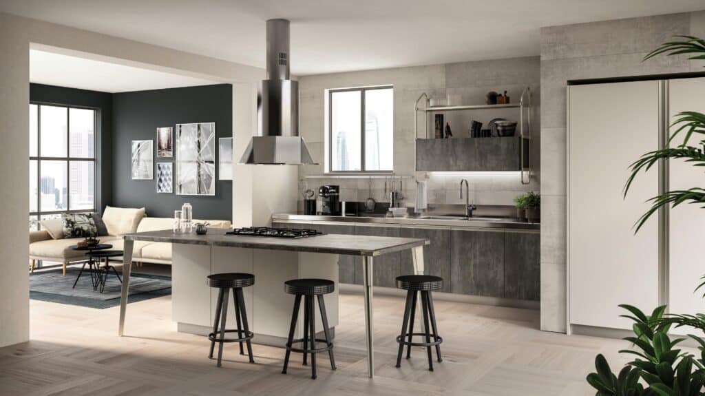 Modern kitchen interior with a central island, bar stools, stainless steel appliances, and open shelving, connected to a living area with a sofa and wall art.