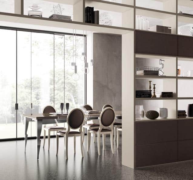 Modern dining room with a table set for six, surrounded by elegant chairs, and large glass windows in the background.