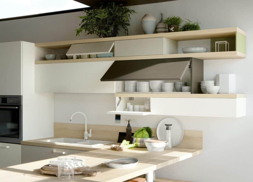 Modern kitchen with white cabinets, open shelving, a built-in oven, and a minimalist sink area.
