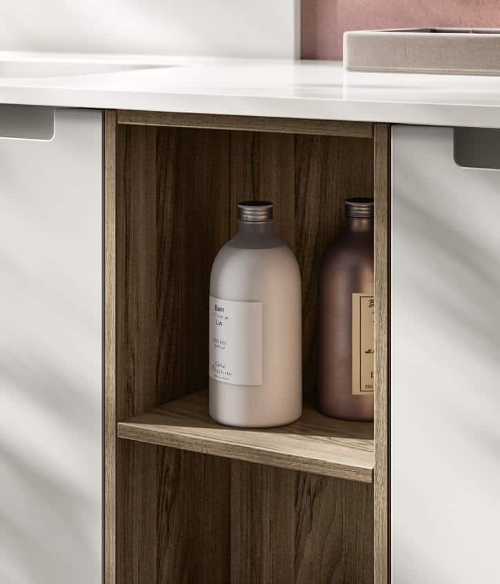Bathroom shelves with two lotion bottles.