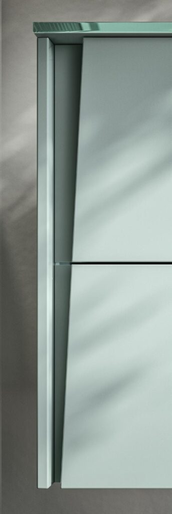 Close-up of a modern, sleek cabinet with a metallic finish and minimalistic design.