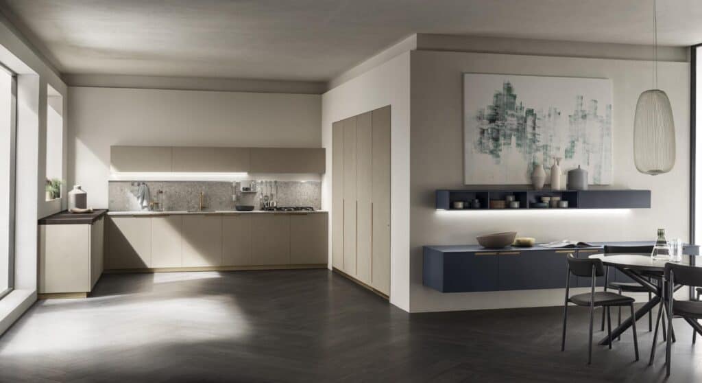 Modern kitchen and dining area with light wood cabinets, minimalist decor, dark wood flooring, a dining table with chairs, and abstract wall art.