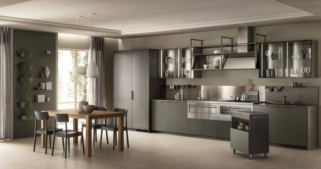 Modern kitchen with dark cabinetry, stainless steel appliances, and open shelving; includes a wooden dining table with chairs, and large windows with curtains.
