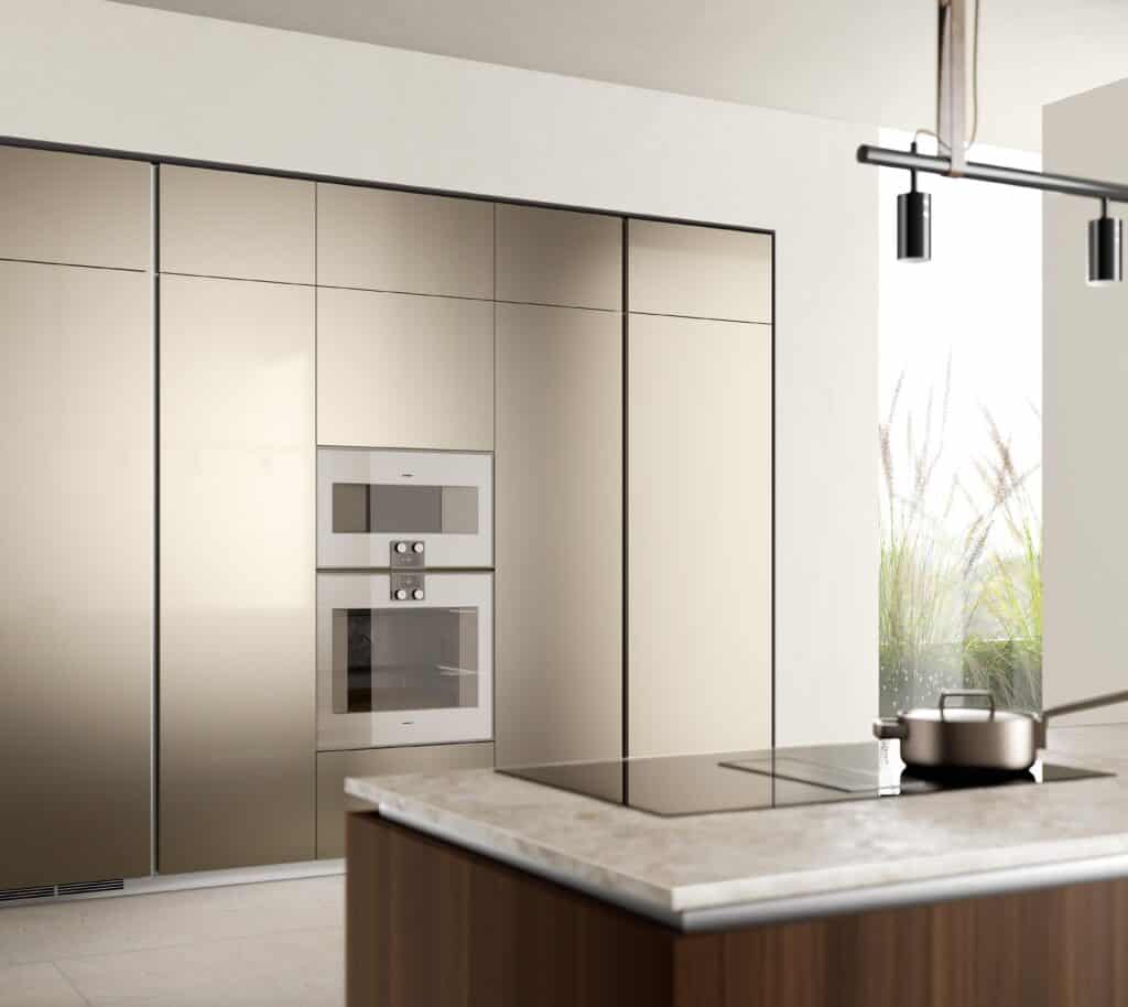Modern kitchen with sleek cabinetry, built-in oven, induction stovetop, and minimalist design elements.