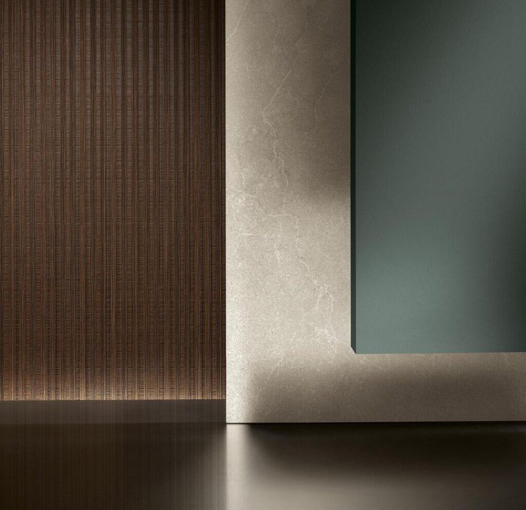 A textured brown wall panel meets a smooth, light beige surface with a green accent wall, creating a modern and minimalistic design.