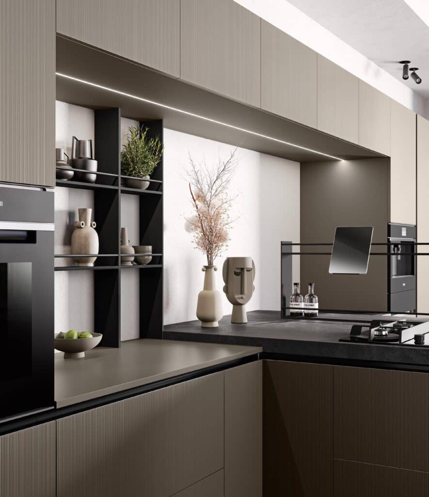 Modern kitchen with sleek cabinets, an oven, open shelving with plants and decor, a vase with dried flowers, and a minimalist design.